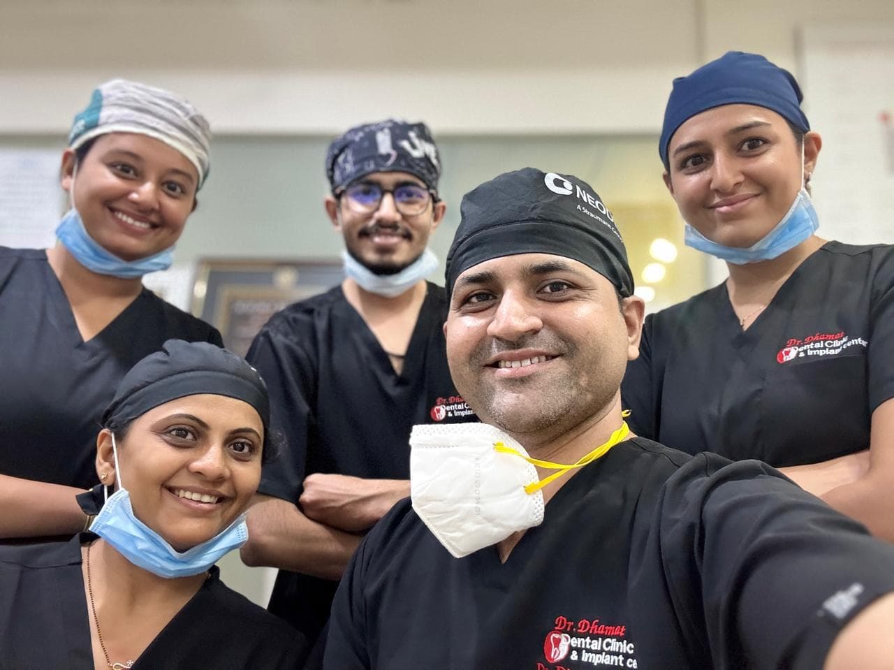 Dr. Dharmesh Dhamat and the clinical team at Dr. Dhamat Dental Clinic